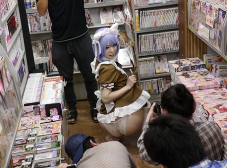 Japanese cosplayer Miku Oguri gets gangbanged in an adult video store 14726449