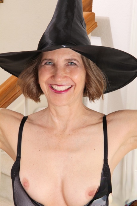 Old woman strips off her Witch attire before spreading her twat with red nails 96294900