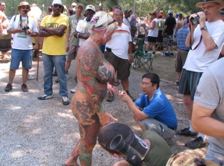 Candid behind-the-scenes action during a stripshow at a clothing optional club 61142235
