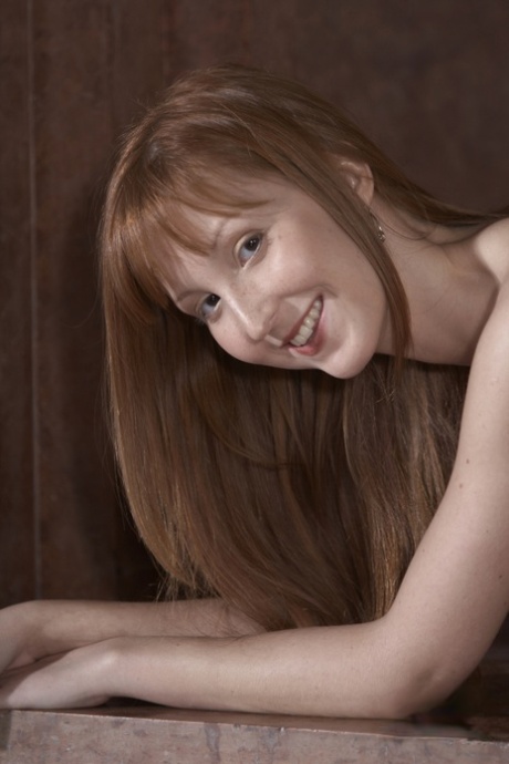 Pale redhead Baby Silver flaunts her small tits and thin body in the nude 58418474