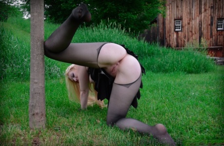 Blonde female Delirious Hunter is restrained in a variety of ways 17384533