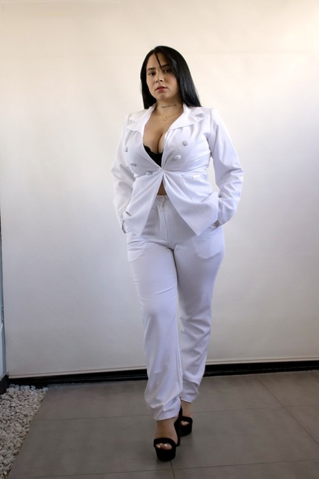 Thick Latina teen Kim Velez unleashes her large breasts in thong underwear 11043877