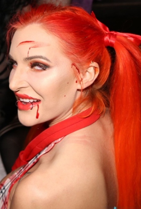 Caucasian girls take part in a blowbang during a Halloween party 12175677