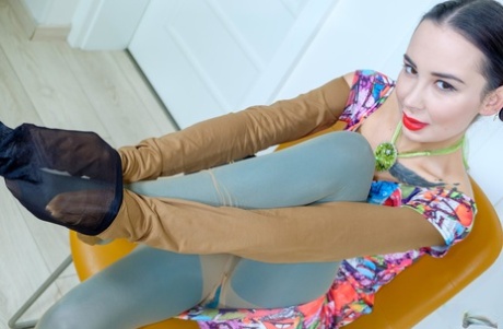 Clothed girl Freya Dee sports red lips while covering herself in pantyhose 35881681