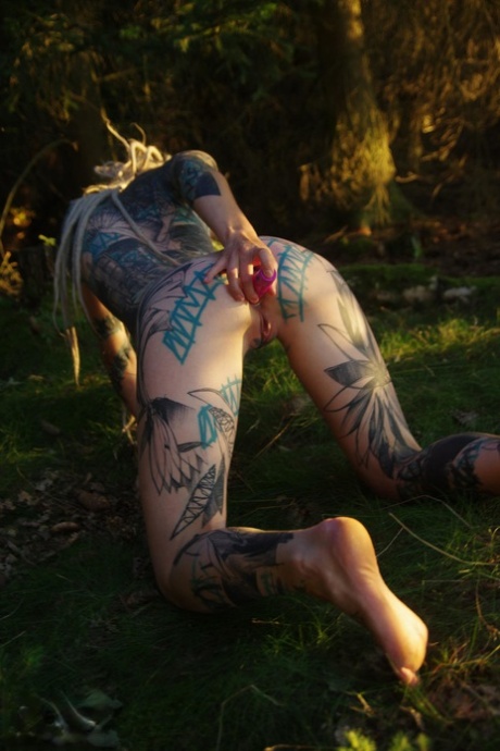 Tatted freaks Anuskatzz & Lily Lu have sexual intercourse on the forest floor 51529137