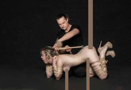 Naked white girl Kama Medea is suspended by ropes while anally hooked 96752166