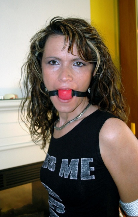 Clothed female drools while ball gagged with her arms tied behind her back 94941195