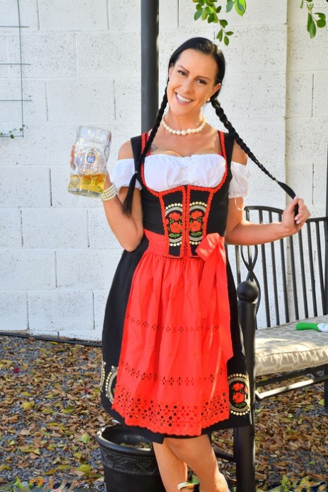 Dark-haired chick spreads her naked twat before donning Oktoberfest attire 29568593