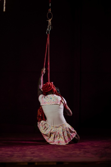 Tattooed brunette is suspended from the ceiling while tied up with ropes 32335026