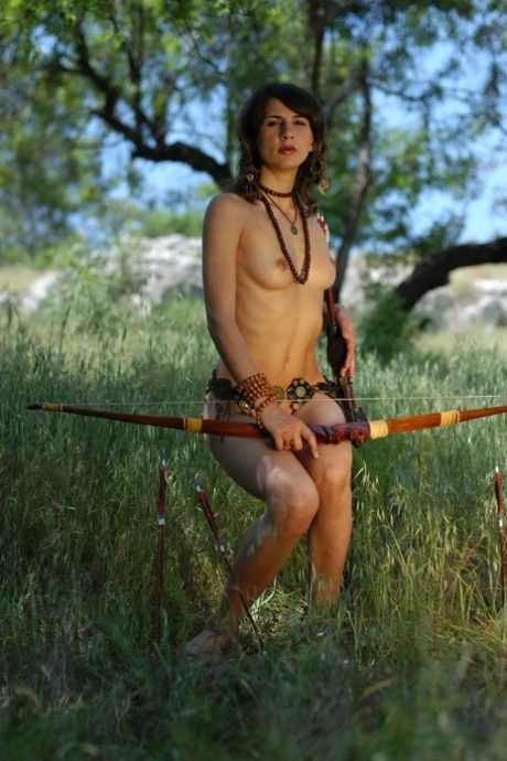 Beautiful teen Vetta A goes hunting with a bow and arrow in the nude 76902124