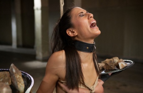 Skinny brunette undergoes a painful slave training session 79821959