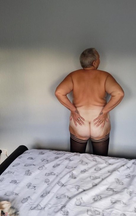 Overweight granny Valgasmic Exposed sheds her lingerie to pose nude in hosiery 86208240