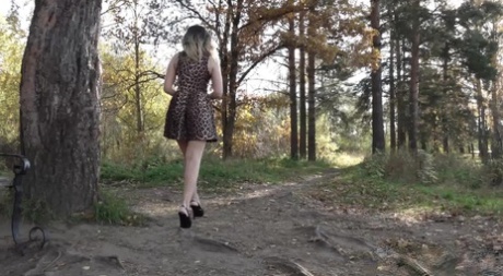 Caucasian chick Diana takes a piss while sitting on a bench in a park 68503554