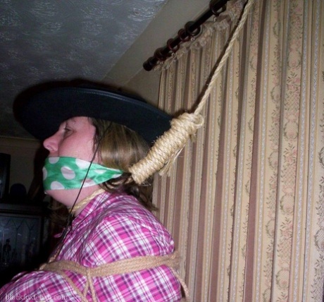 Amateur girl shows her big tits while gagged and noosed in a bedroom 33164595