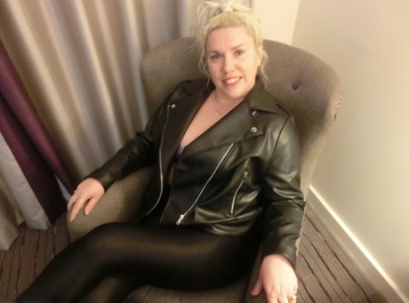 Mature blonde Barby strips to her heels before masturbating on a bed 52263168