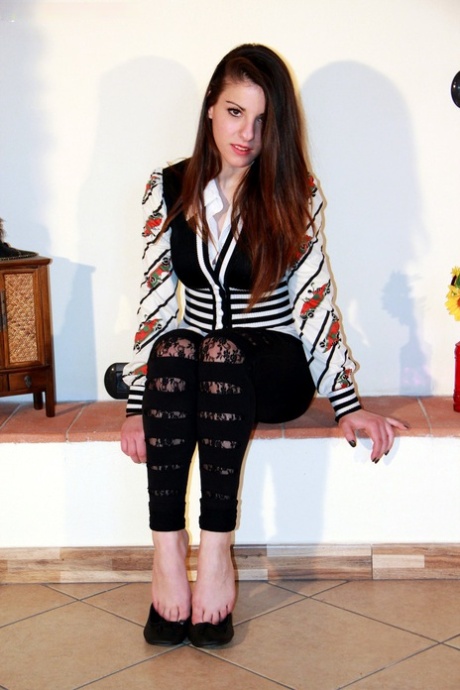 Nice girl takes off flat shoes before curling her pretty toes 71308946