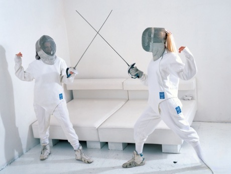 Female fencers Mili Jay & Julie Silver partake in FFM after a duel 83752314