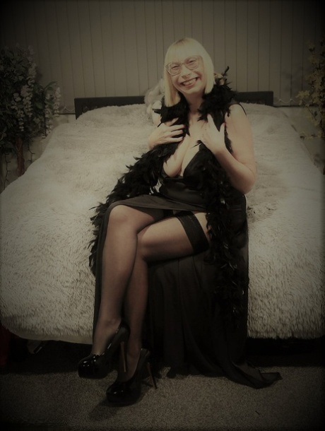 Mature British woman with blonde hair Barby Slut toys her pussy in stockings 18244182