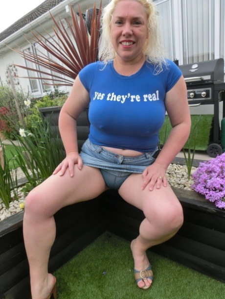 Mature blonde fatty Barby gets naked while doing her gardening 50216503