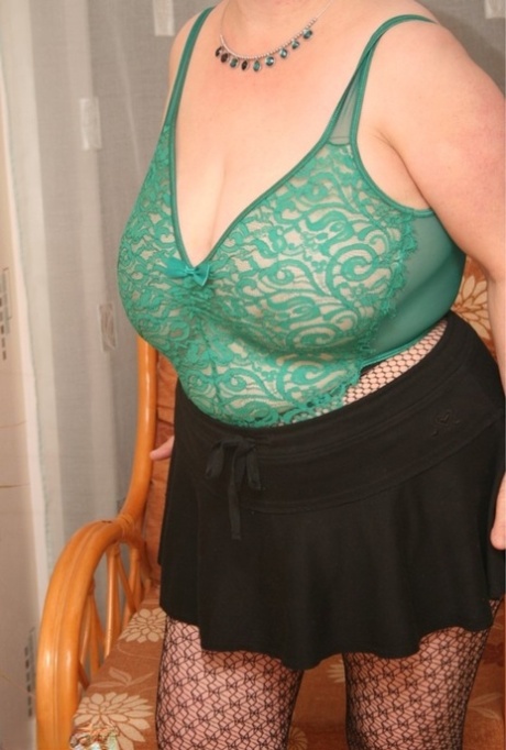 British fatty Kinky Carol strips to her lingerie while wearing patterned hose 17647096