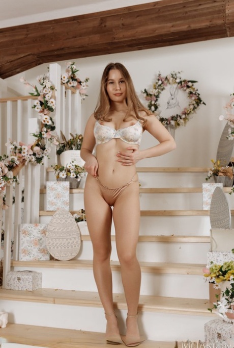 Young beauty Amalia Davis gets naked in heels on a set of steps 61780060
