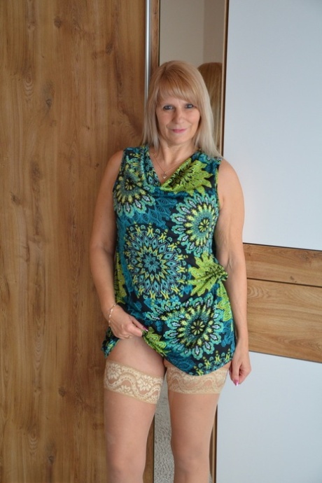 Middle-aged blonde Sweet Susi shows her tits and cunt both indoors and outside 56707883