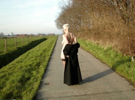 Mature blonde Tiffany Pearl shows her naked body while visiting a farm 83845408