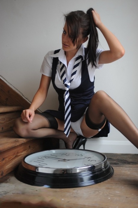 British chick Helen Louise shows her upskirt underwear while fully clothed 85440398