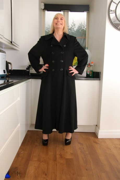 Older British lady with blonde hair Barby Slut toys her pussy in the kitchen 62334167