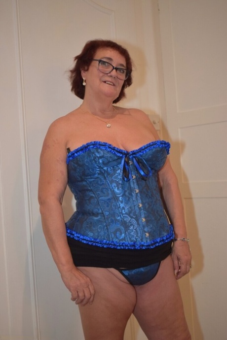 Overweight granny Phillipas Ladies undoes her bustier during solo action 13545609