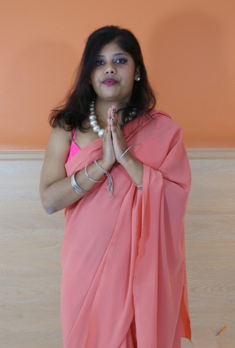 Overweight Indian female Rupali Bhabhi cups her boobs as she gets naked 20698708