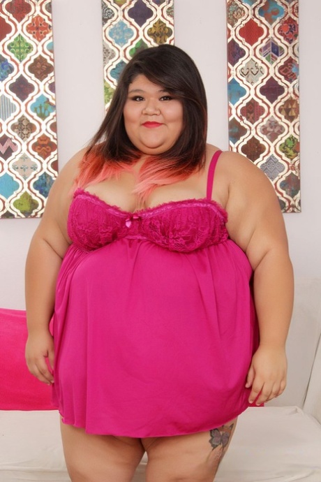 SSBBW Asian teen on knees sucking cock & showing big saggy boobs in heels 43280051