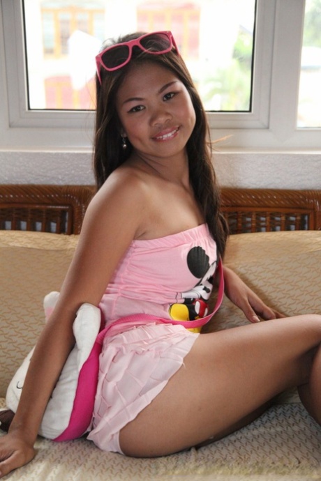 Petite Asian first timer removes Mickey Mouse top on way to getting naked 68109521