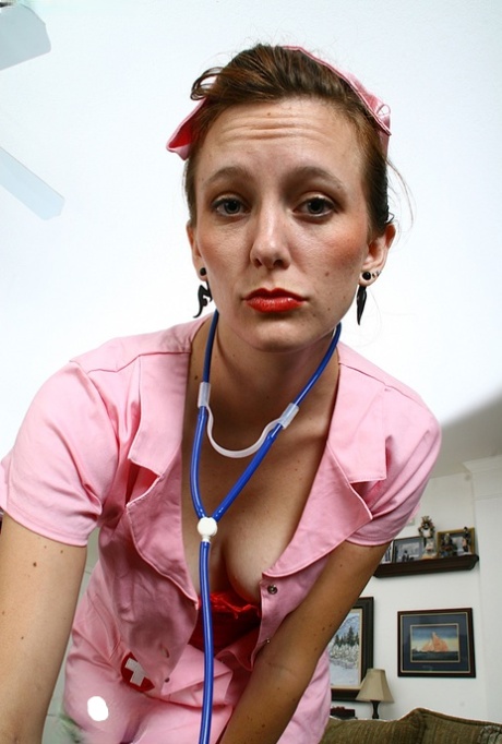 Salacious mature nurse in fancy nylons undressing and teasing her twat 92672261