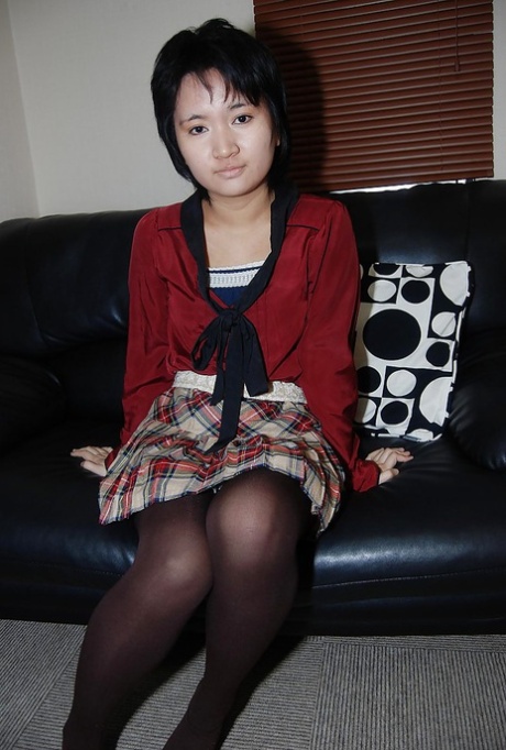 Short-haired asian chick in pantyhose undressing and exposing her twat 72827843