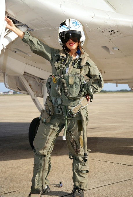 Skillful pilot Roni showing her big boobs and shaved pussy on her plane 95954149