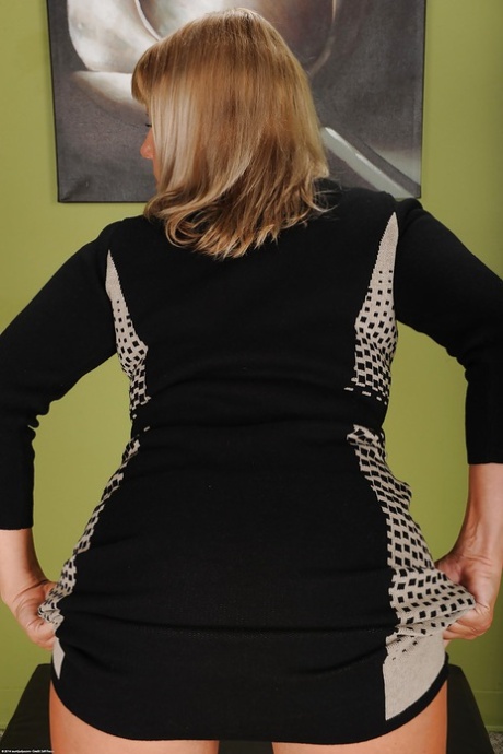 Experienced blond lady Kayla Larson removing bra and panties 54991356