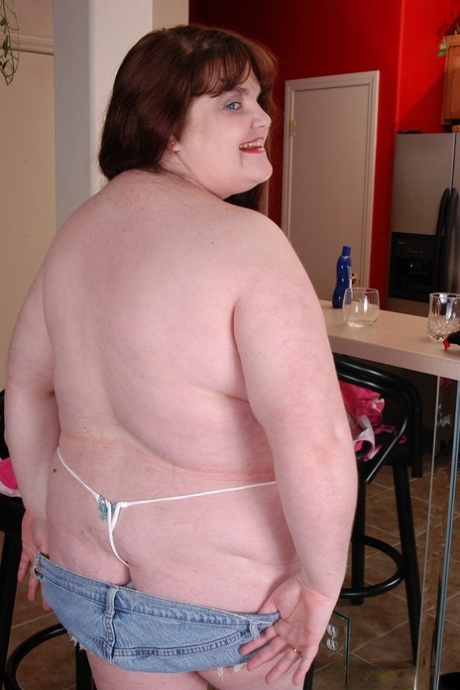 Mature fat lady Gillian stripping in kitchen and fondling saggy tits 80151298