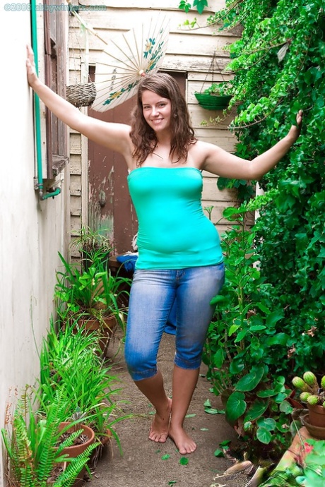 Pretty amateur Megan flashes big natural tits outdoors while fingering cunt 28436327