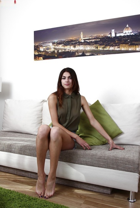 Amateur teen girl Elina Bradley peeling off cutoff shorts while undressing 67570377