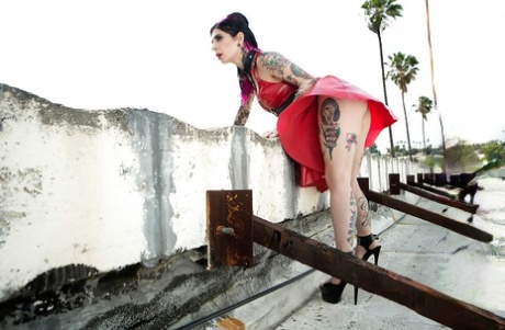 Luscious MILF in a sexy red dress Joanna Angel shows off curvy tattooed body 19777571