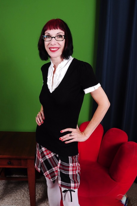 Skinny MILF in glasses Alyce Porter slowly strips showing tiny tits and pussy 48587803