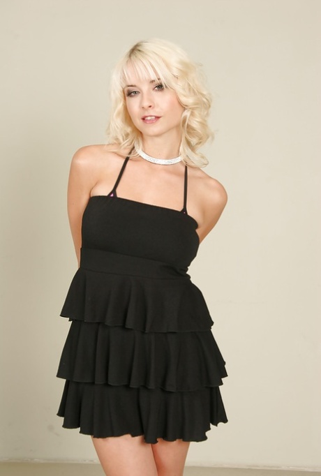 Beautiful blond pornstar Mia Magma doffs black dress and lingerie to pose nude 80093735