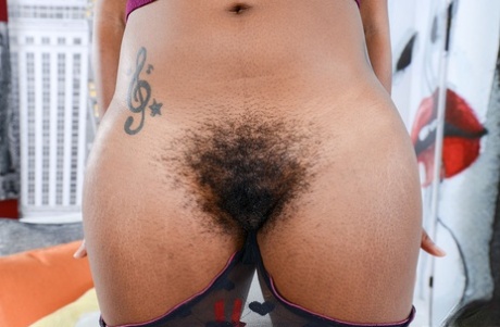 Ebony amateur Janelle Taylor displays her hairy snatch after getting naked 62240836