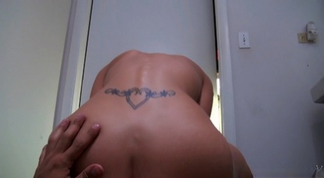 Hooker with a back tattoos sucks and fuck her client POV style in a washroom 11754516