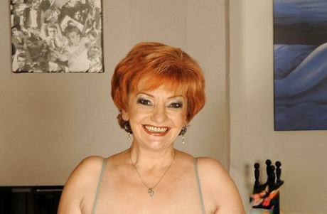 Busty granny on high heels shows her fatty body and her hairy cunt 85102533