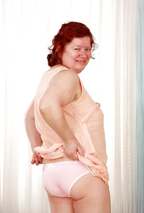Fatty redhead granny with massive jugs stripping off her clothes 54709498