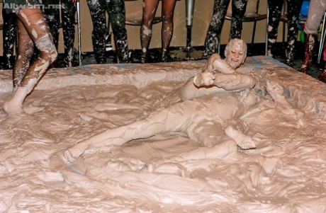 Fully clothed fashionistas make a wild catfight in the mud 88991065