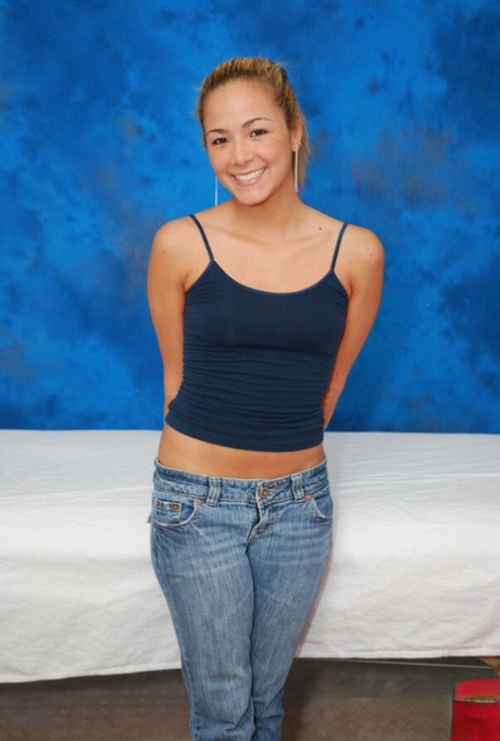 Smiley teenage sweetie gets rid of her clothes preparing for a massage 97776866