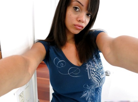 Bosomy ebony amateur Stacey Foxxx getting naked and picturing herself 61630641